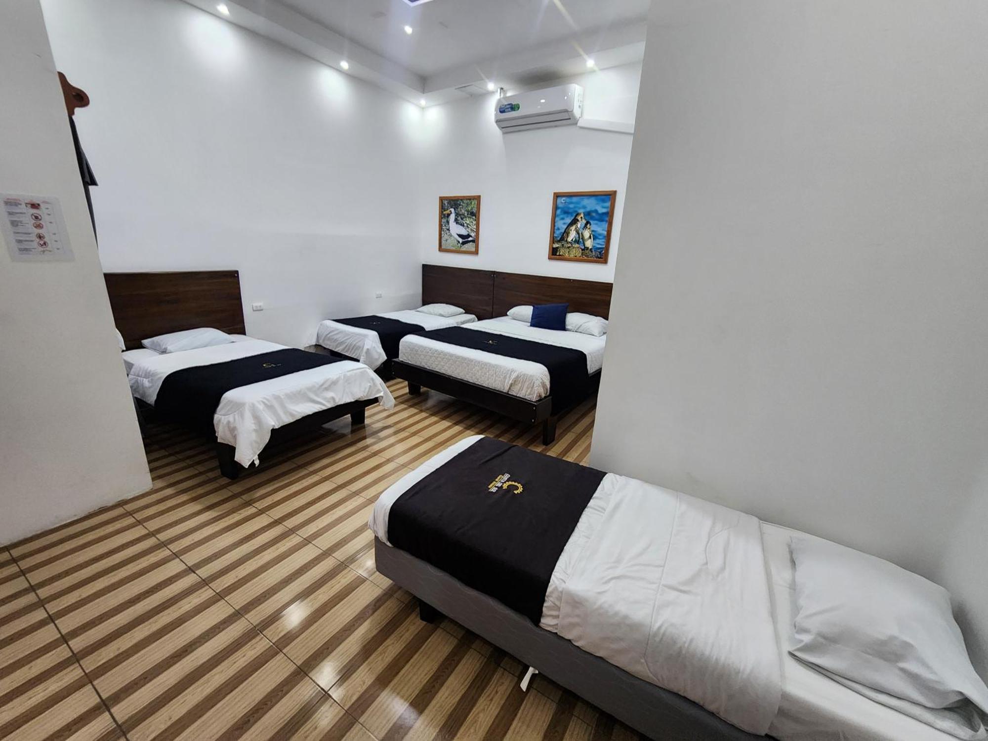 Costa Del Sol Hotell Puerto Ayora  Rom bilde